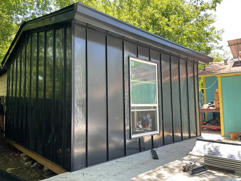 Black standing seam metal wall panels for Metal Roof Installation in Columbine