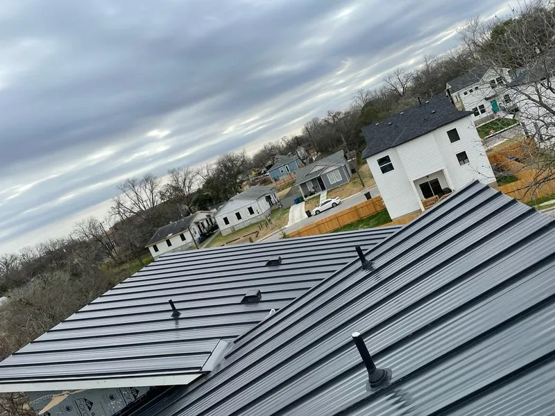 Standing seam metal roof panels with vents for Skylight Repair in Columbine